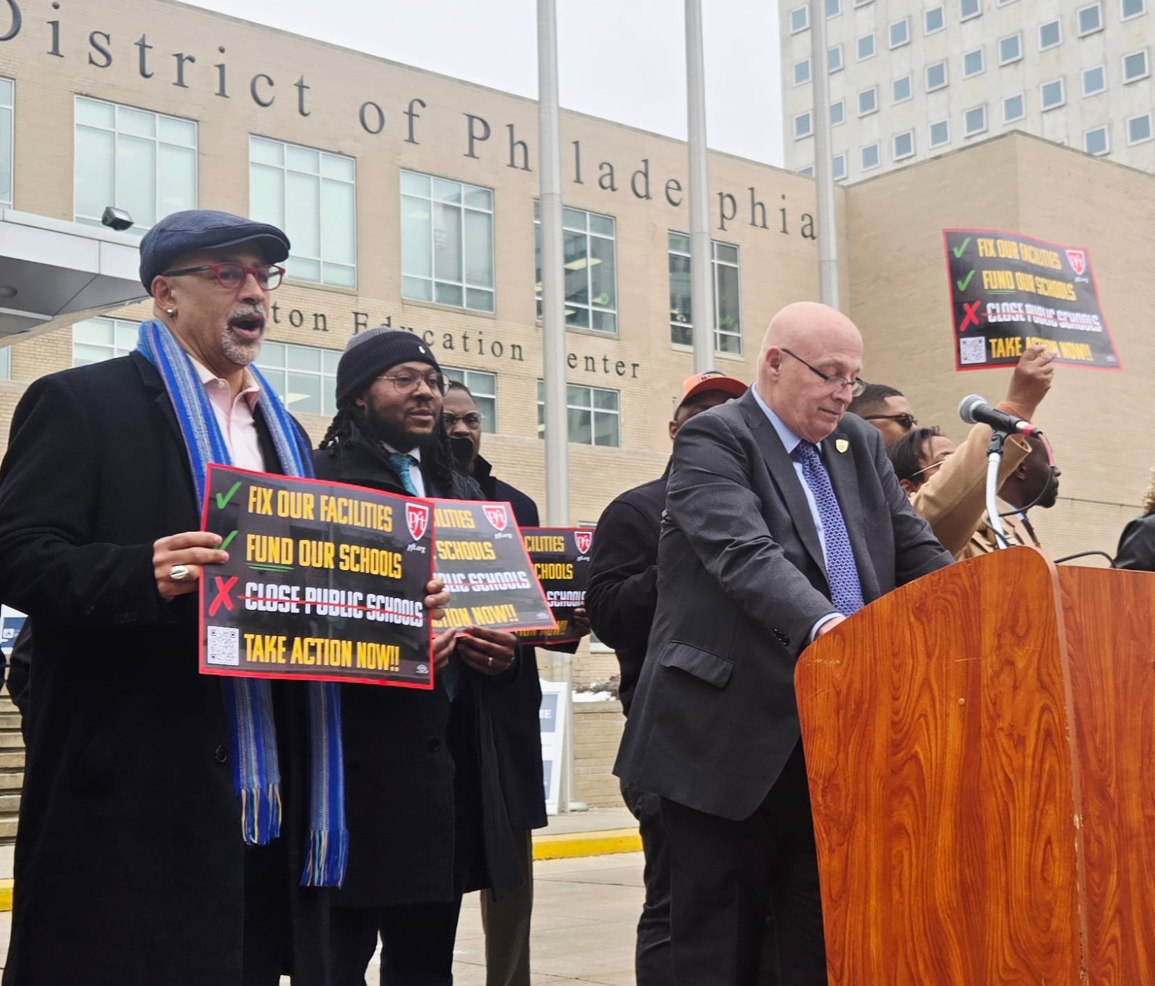 PFT President Arthur Steinberg speaks at a rally opposing school closures. Rep. Chris Rabb is to his right.